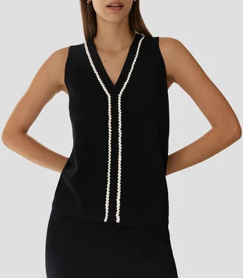 Blusa lisa sin mangas Mujer