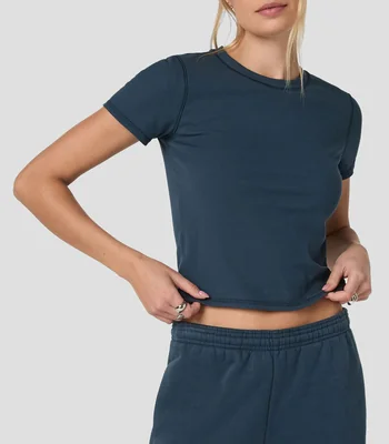 Playera para entrenamiento cuello redondo manga corta lisa Mujer