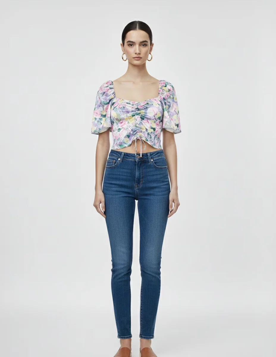 Top con manga pieces cuello redondo