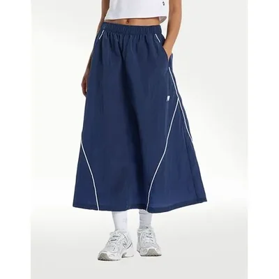 FALDA NEW BALANCE Sport Legacy