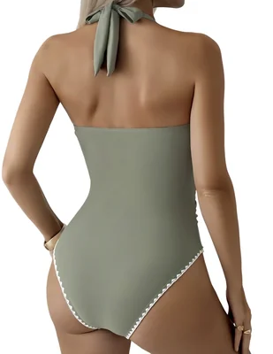 Traje de baño entero con escote halter y detalles en contraste
