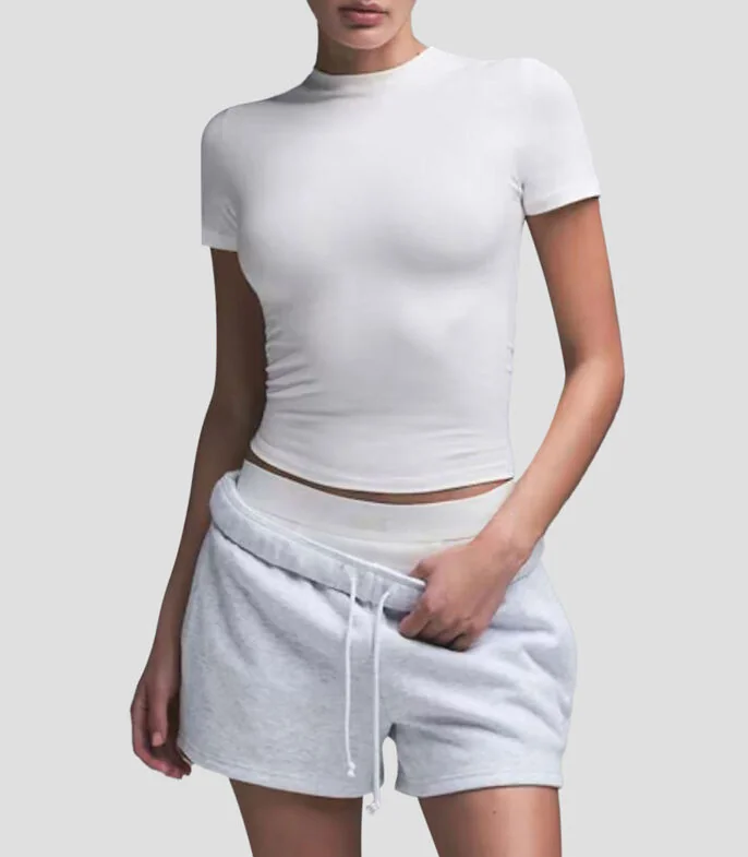Playera de cuello redondo con manga corta lisa Mujer