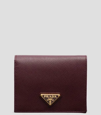 Cartera en piel con detalle texturizado Mujer