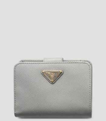 Cartera en piel con detalle texturizado Mujer