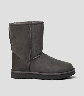 Botas largas planas Clásico en piel Mujer