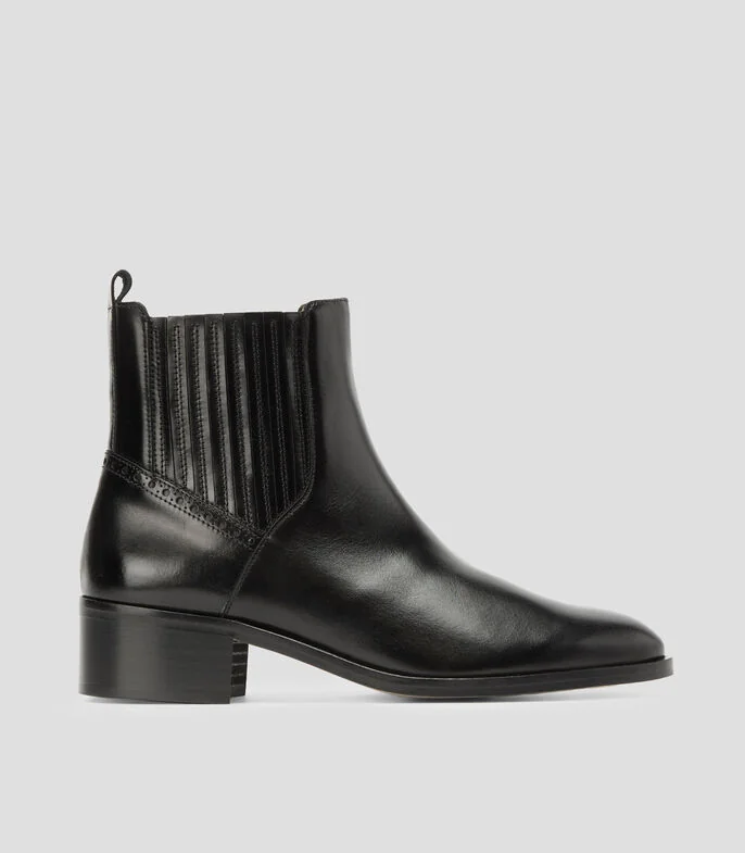 Botines con tacón bajo media luna Mujer