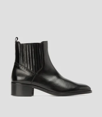 Botines con tacón bajo media luna Mujer