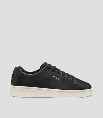 Tenis de piel de napa con logo en tono dorado Hombre