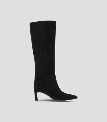 Botas largas en piel con tacón bajo de aguja Mujer