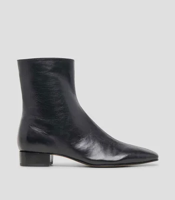 Botines en piel con tacón bajo cuadrado lisos Mujer