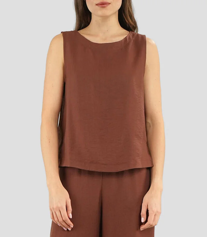 Blusa lisa sin mangas Mujer