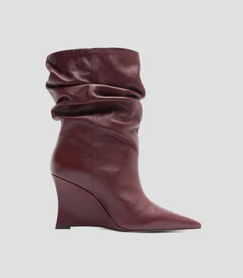 Botas con tacón alto de cuña Mujer