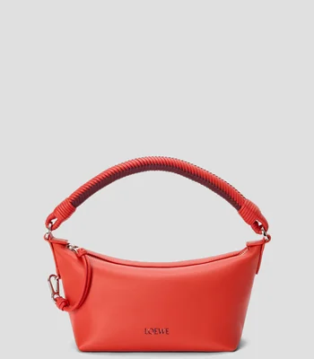 Bolsa pouch lisa con detalle texturizado Mujer