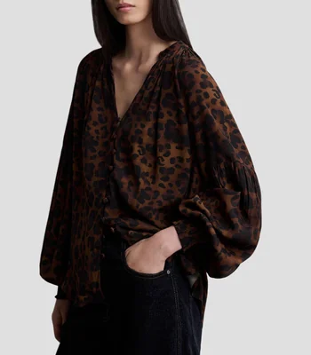 Blusa en Animal Print manga larga Mujer