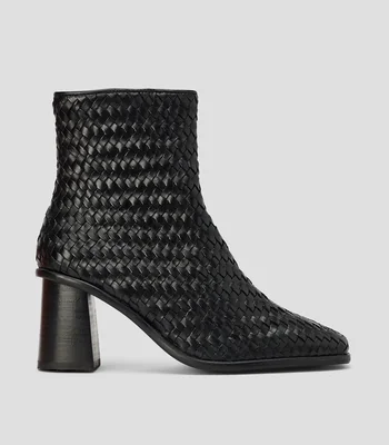 Botas casuales en piel con tacón medio de media luna Mujer