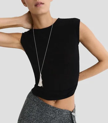 Blusa lisa sin mangas Mujer