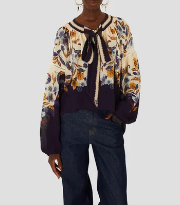 Blusa manga larga estampada Mujer