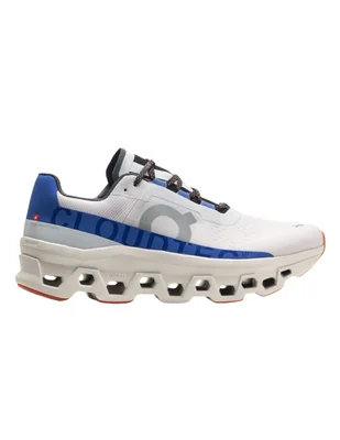 Tenis On Cloud Cloudmonster para hombre color blanco suela naranja