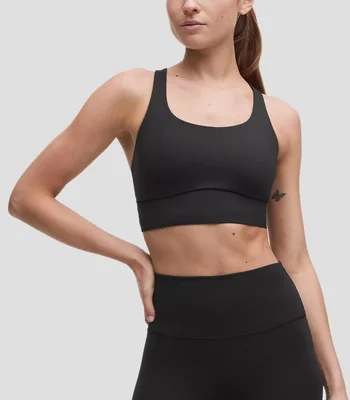 Top deportivo liso con soporte medio Mujer