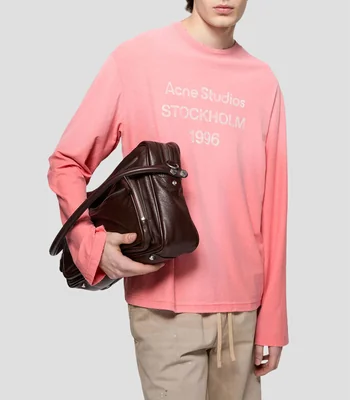 Playera cuello redondo manga larga lisa con nombre de marca Hombre