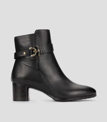 Botines con tacón de media luna Mujer