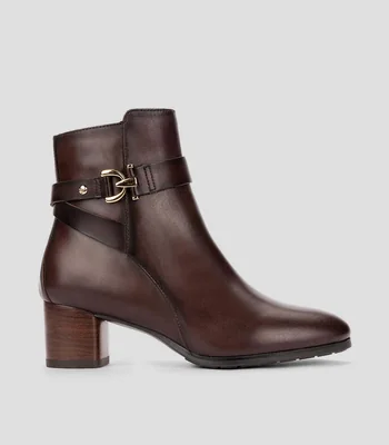 Botines con tacón de media luna Mujer