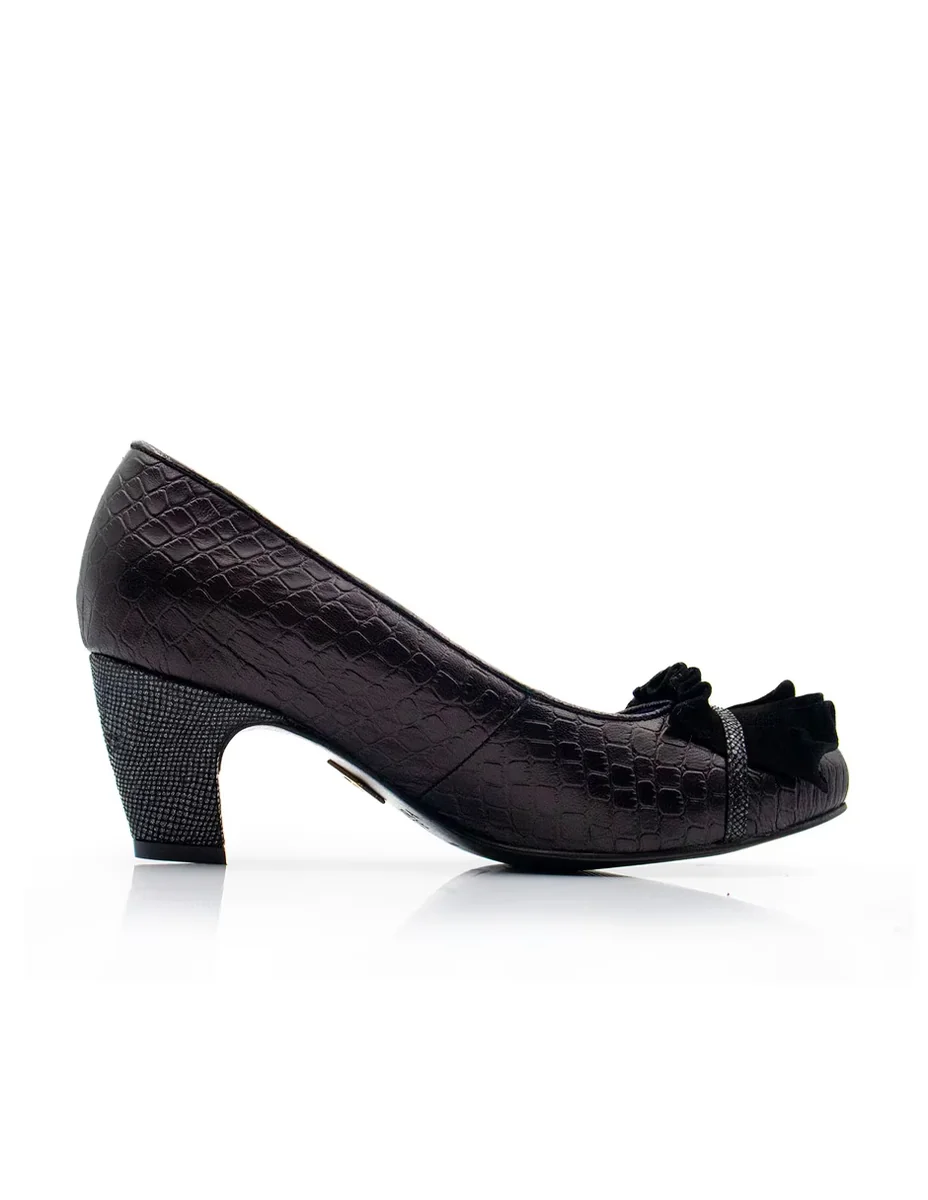 Zapatilla de piel
