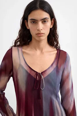 Blusa Manga Larga Transparente