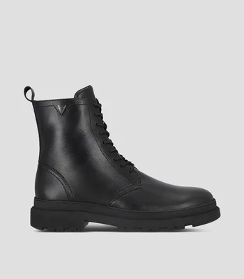 Botas casuales en piel con tacón media luna Hombre